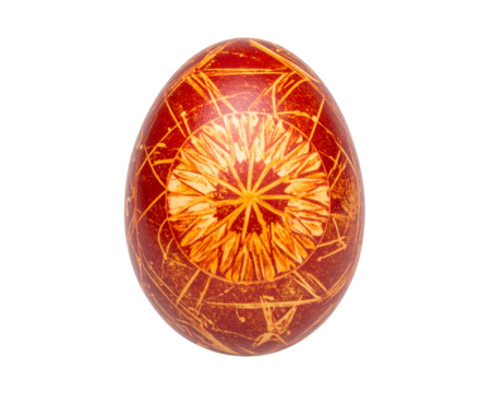 A golden and red Easter egg with an orange pattern on it isolated on a transparent background