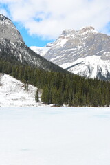 FIELD, BRITISH COLUMBIA, CANADA - April 13th 2025: A stunning spring time day at Emerald Lake in Yoho National Park, British Columbia with unreal, scenic nature views in popular tourism area of Canada