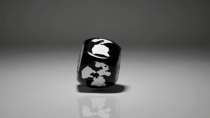 Black dice with continents of world map printed on its faces is rolling on reflective gray surface, representing concept of global uncertainty and interconnectedness - Powered by Adobe