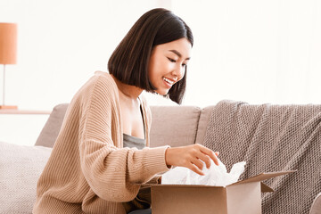 Fast Delivery Service And Satisfied Customer. Portrait of smiling curious asian female consumer...