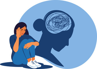 Depressed woman sitting on floor and hugging knees. Mental health concept. Depression, bipolar disorder, obsessive compulsive, post traumatic stress disorder.