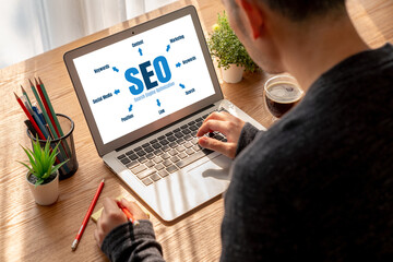 SEO search engine optimization for modish e-commerce and online retail business showing on computer...