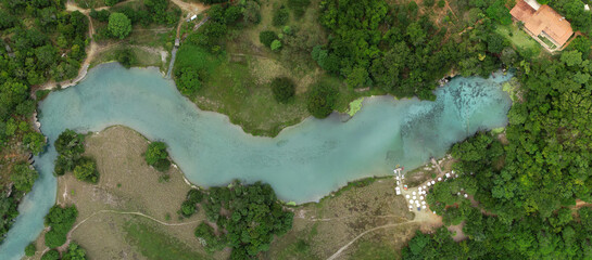 Aerial panorama of natural blue pool in environmental reserve