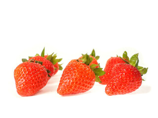 Tasty red strawberry on white background. Fine fruits. Tasty snack. Agriculture industry and food supply. Healthy meal choice.