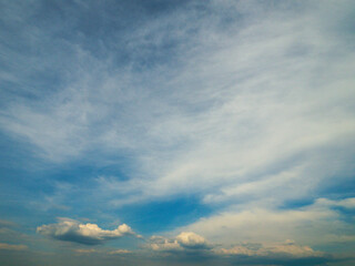 Obraz premium Beautiful blue cloudy sky. Nature background for design.