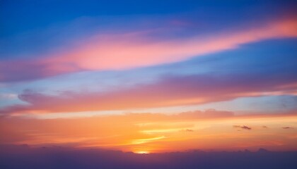 Fototapeta premium gradient orange gold clouds and sunlight on the blue sky perfect background wallpaper