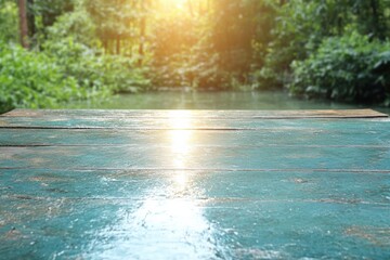 Sunlight reflecting on a wooden dock by a serene lake surrounded by lush trees in a peaceful forest