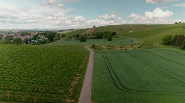 Drone Footage of Tractors Driving and Standing on Farmland &ndash; Aerial View of Agricultural Machinery in Action