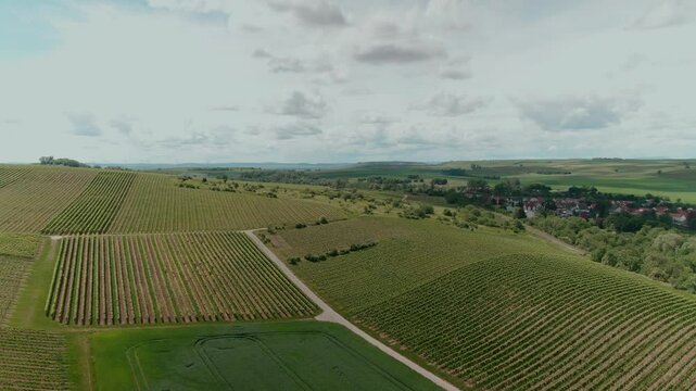 Drone Footage of Tractors Driving and Standing on Farmland &ndash; Aerial View of Agricultural Machinery in Action