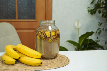 Preparing banana peel fertilizer, soaking in water for houseplants