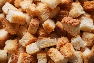 Texture of crunchy croutons as background