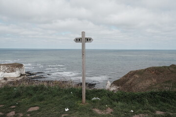 Signpost at the beach