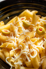 Pasta With Olives, Herbs And Cheese. Healthy Food. Italian Cuisine close up