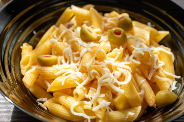 Pasta With Olives, Herbs And Cheese. Healthy Food. Italian Cuisine close up