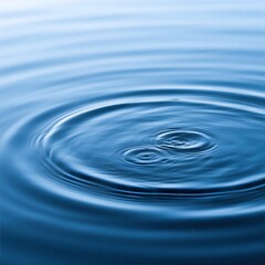 Serene Water Ripples Abstract Photography of Tranquil Blue Water Surface with Concentric Circles and Droplets