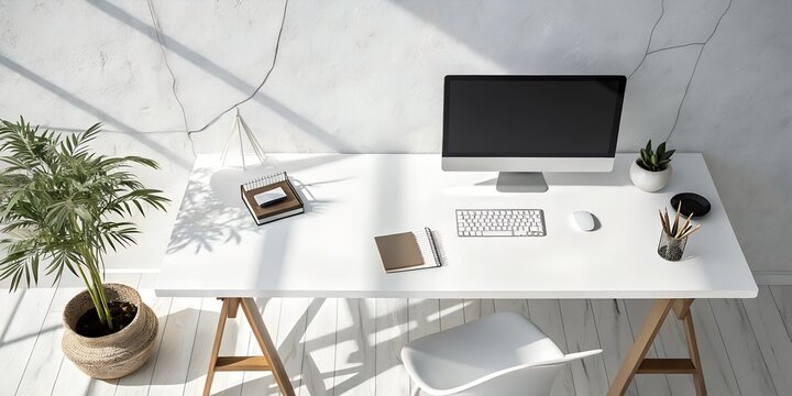 Minimalist Workspace: A modern and stylish workspace, showcasing an aesthetically pleasing arrangement with a computer setup and office supplies, designed for productivity and focus.