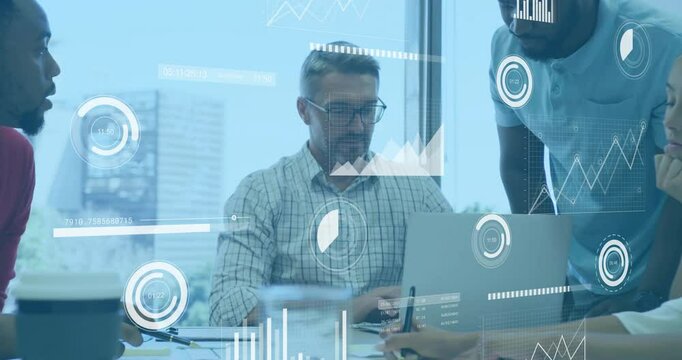 Business team collaborating around laptop in modern office, projecting digital charts overlay