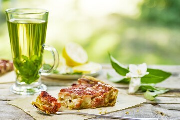 Enjoy a Refreshing Green Tea paired with a Savory Snack while surrounded by Natures beauty