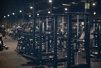 Fitness room with equipment and exercise machines. Space for physical activity, exercise, health and active hobbies.