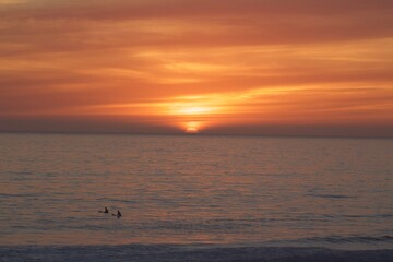 gorgeous beautiful pink orange yellow sunset golden hour in pacific beach san diego california