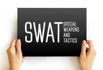 SWAT - Special Weapons And Tactics is a police tactical unit that uses specialized or military equipment and tactics, acronym text concept on card