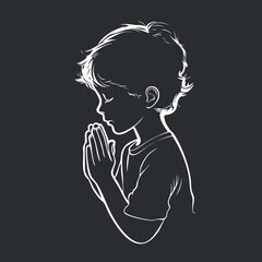 Silhouette of a young boy praying with closed eyes and hands together in a peaceful gesture