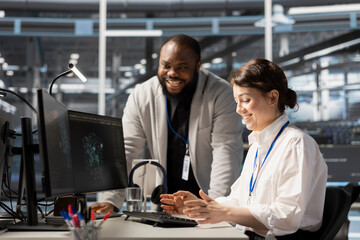 Delighted data center team leader reacting with satisfaction after seeing improved system...
