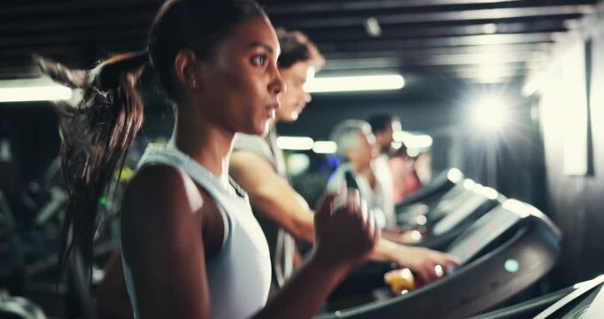 Woman, running and treadmill in gym with legs, athlete training and endurance for health. Cardio, exercise equipment or machine with female runner, intense and action for wellness at fitness center