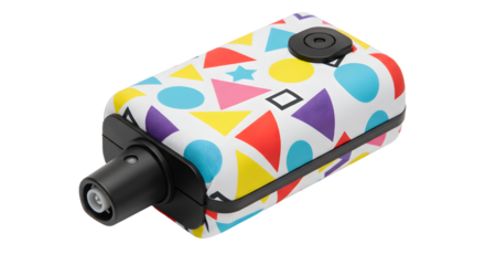 Colorful compact camera with geometric patterns, showcasing vibrant design against a neutral background, ideal for photography enthusiasts