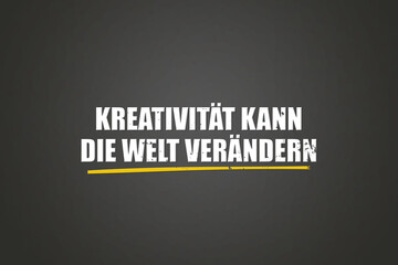 Kreativitaet kann die Welt veraendern (Creativity can change the world) - A blackboard with white text.