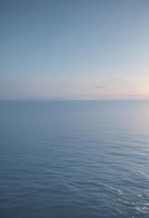 Gentle, fading light blue gradient; evokes a tranquil sea Abstract design, peaceful atmosphere , serene, backdrop, light