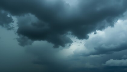 Dramatic dark clouds in the stormy sky.