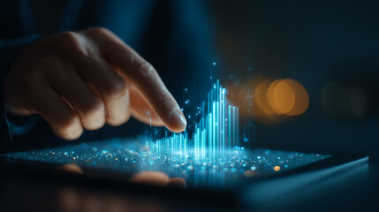 Finger interacts with glowing digital graph on tablet screen, symbolizing data analysis, growth, and technological advancement in business
