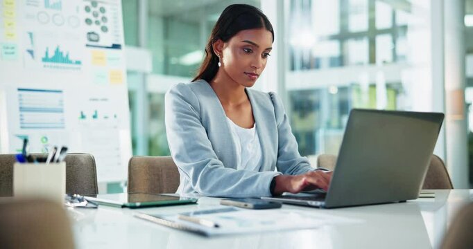 Laptop, data analysis and business woman typing in office for financial email, research chart and metrics online. Reading, computer and worker writing report for stats, risk management and investment