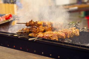 Grilled kebabs on charcoal grill