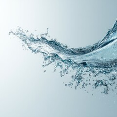 Water splash with droplets against a light background creating a dynamic effect.