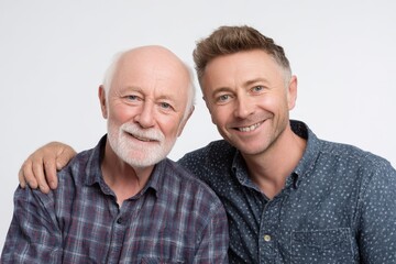 Happy father and son smiling together.