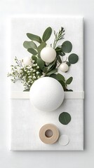 White Bath Bomb with Eucalyptus and Flowers on White Background