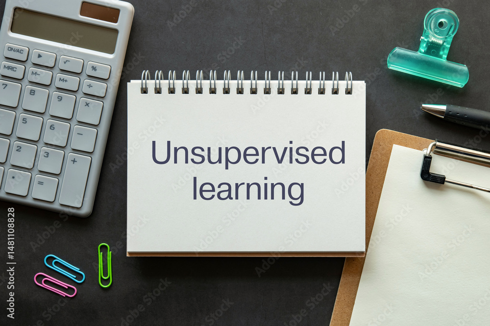 Poster there is notebook with the word unsupervised learning. it is as an eye-catching image.