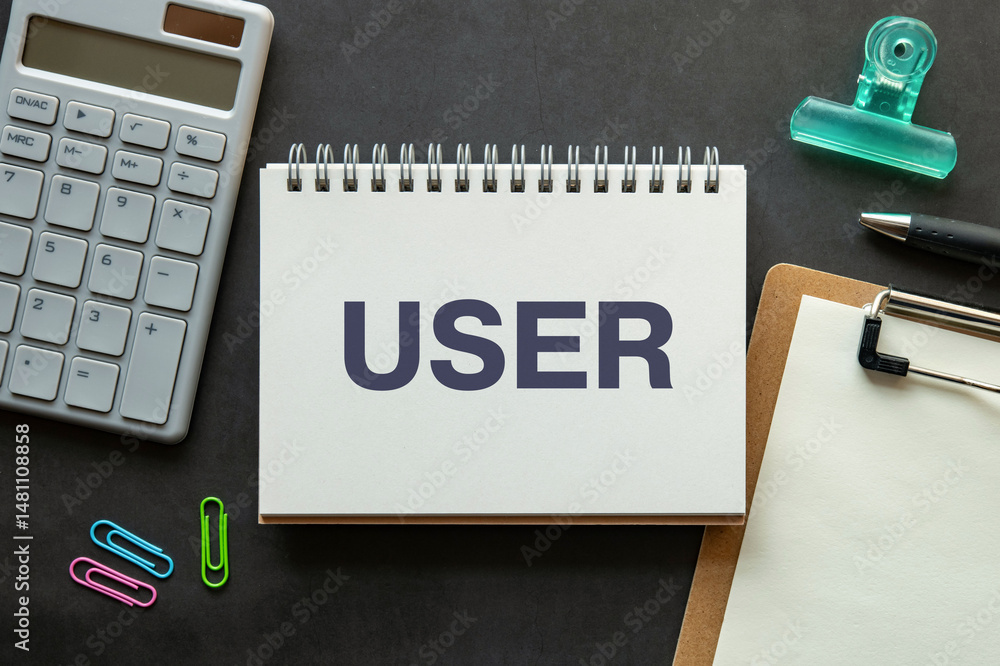 Poster there is notebook with the word user. it is as an eye-catching image.