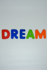 Vibrant wooden letters spell 