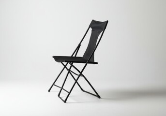 Fototapeta premium Isolated image of a single folding chair isolated on white background