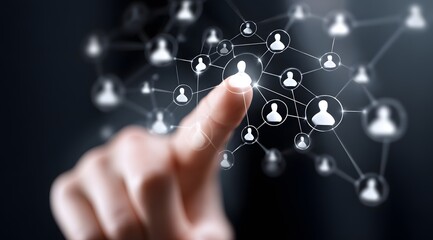 A hand pointing towards a digital network of interconnected user profiles symbolizing social media connections and online community engagement in the modern digital age