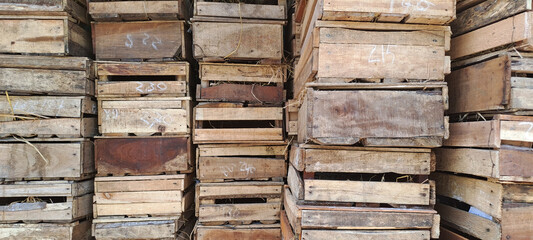 wooden boxes used to store fruits or vegetables in farms or shops. Pine wooden box with slats.	
