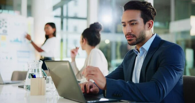 Meeting, businessman and typing with laptop for information, finance and investment in office. Boardroom, male person and financial advisor with tech for research, risk management and reading report