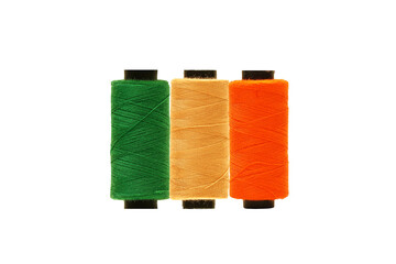 Thread spools background. Various colors sewing kit. Collection of threads. Vibrant vivid colors. Sew threads. Tailor shop texture, isolated on white background 