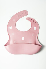 Pink silicone feeding set for babies with compartments, bib, and soft utensils. Ideal for baby led...