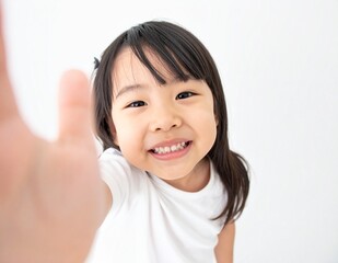 Japanese Girl Reaching Up with a Happy Smile