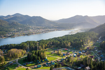 View from Tilan-Tuu mountain showing Biya river flowing into Teletskoye lake. Scenic natural...