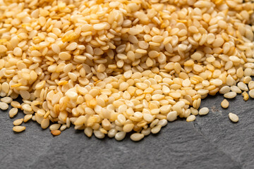 Pile of raw organic sesame seeds - Sesamum indicum